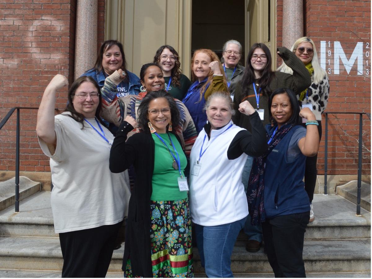 Women at the workshop show their strength