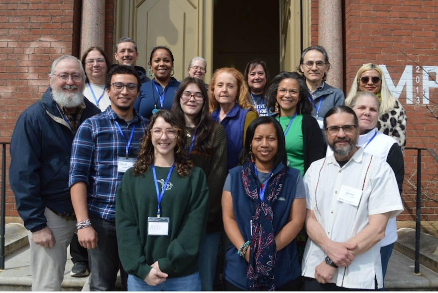 Reclaiming Domains participants pose for photo on steps of Brooks Hall